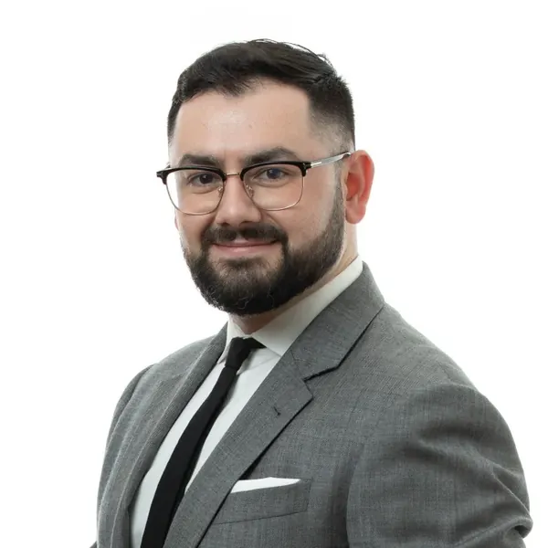Travis J. Stockman, Esq., Long Island attorney at Stockman & Poropat